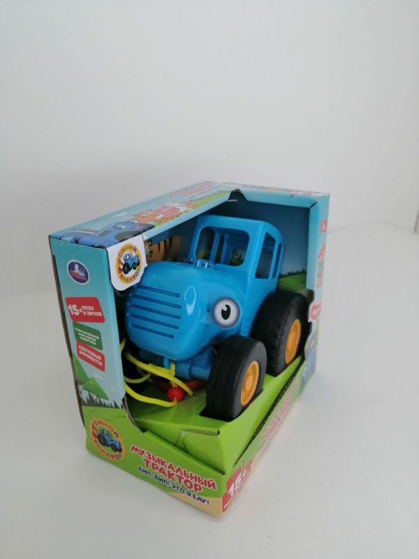 HT848-R(305876) Каталка Синий ТРАКТОР 15+ песен и звуков, свет, в кор, на бат Умка в к